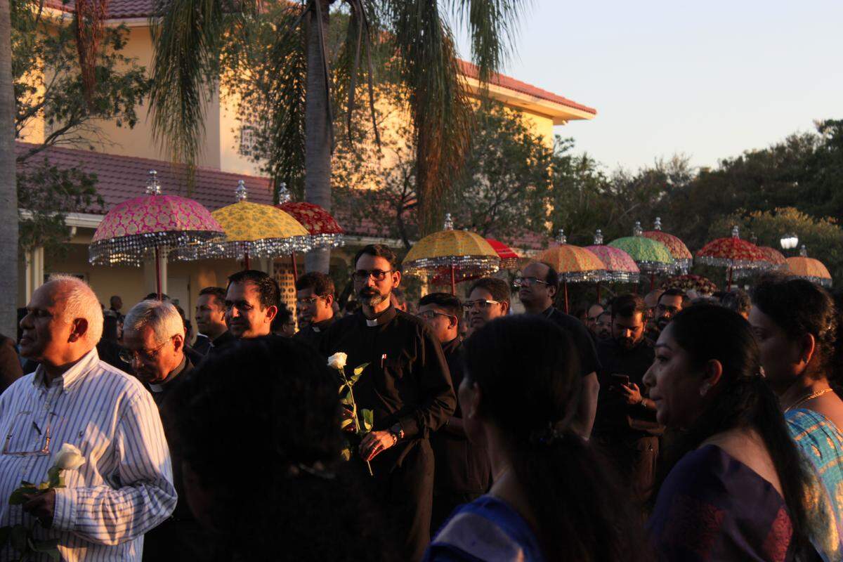 The official procession into Our Lady of Health featured traditional Indian and western dress for the hundreds of clergy gathered for the evening.