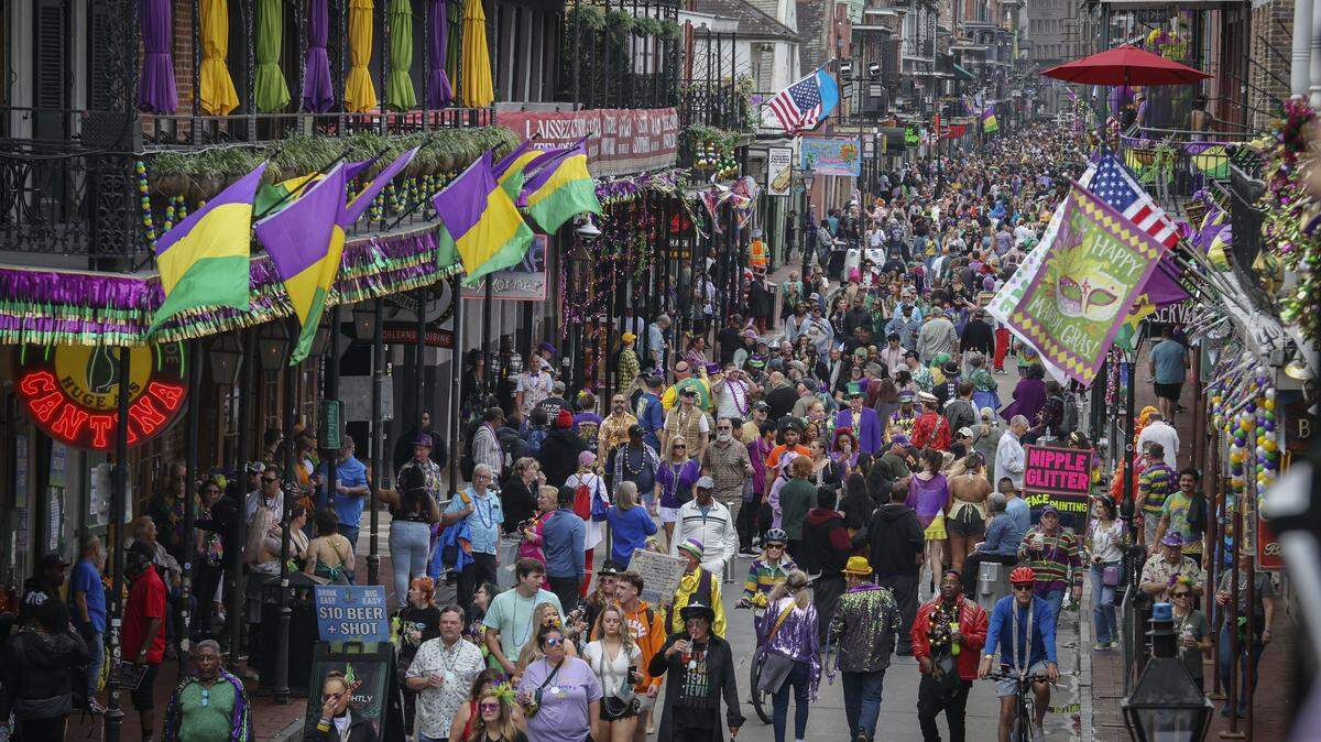 Crowds fill Bourbon Street on Mardi Gras day in New Orleans, Louisiana