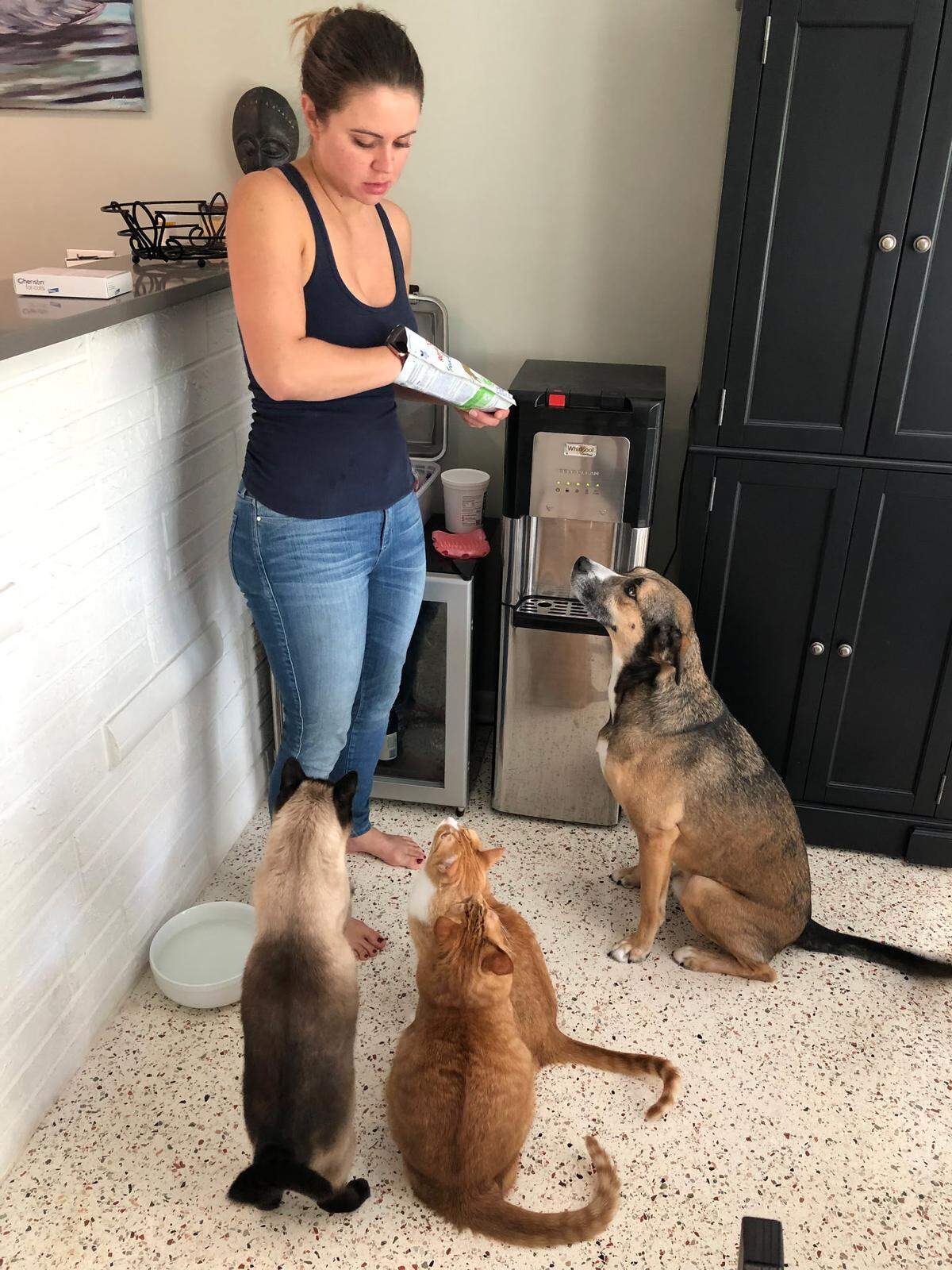 Jessica Lloyd feeds her pets, including her beloved dog Max.