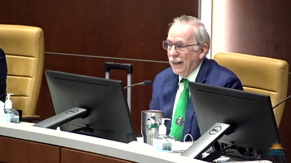 City Attorney J.J. Hearn cautioned speakers not to interfere with the bid procurement process for a comprehensive soccer program in Coral Springs.