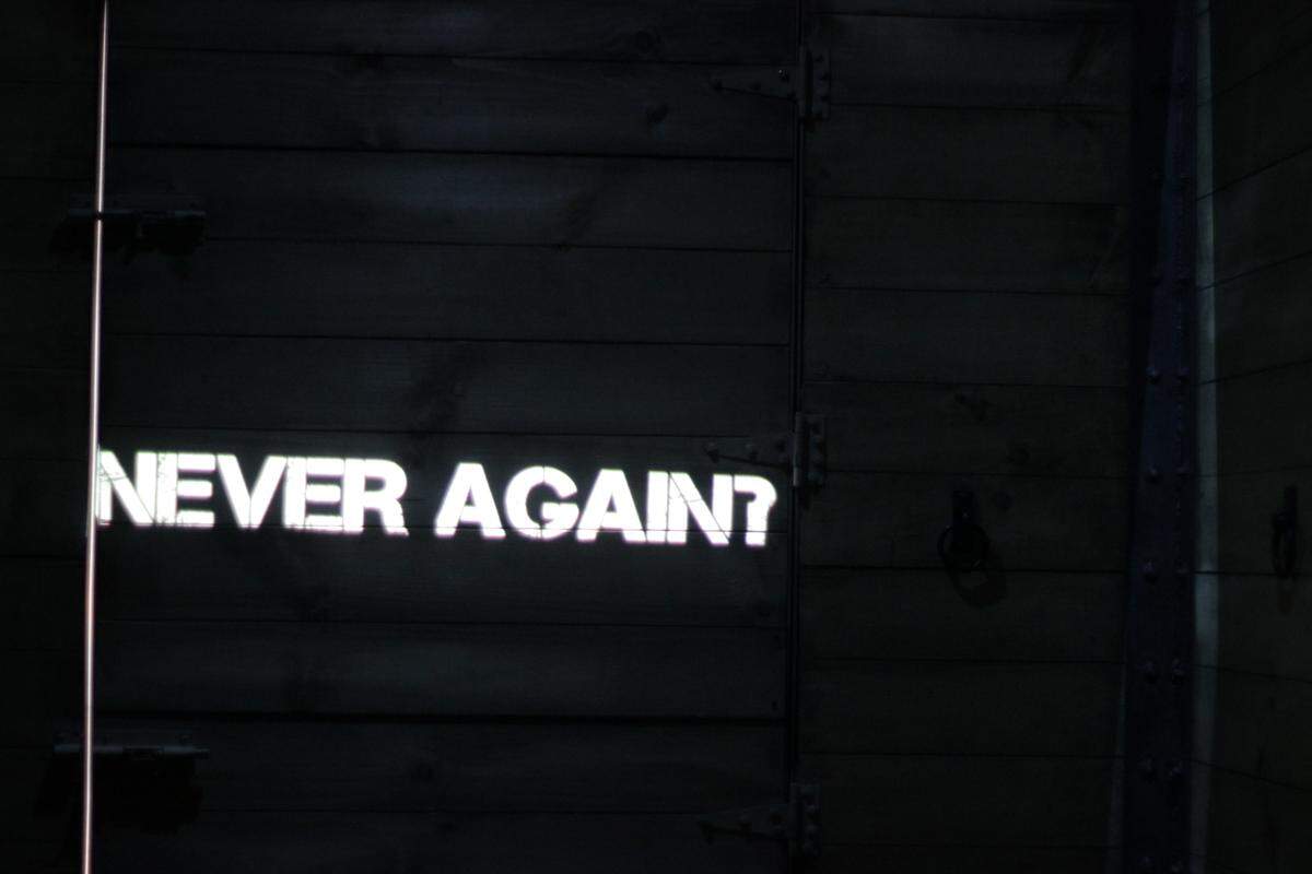 One of the final moments of the cattle car experience asks visitors to interrogate the present day — and urges them to fight against hate wherever they may find it.