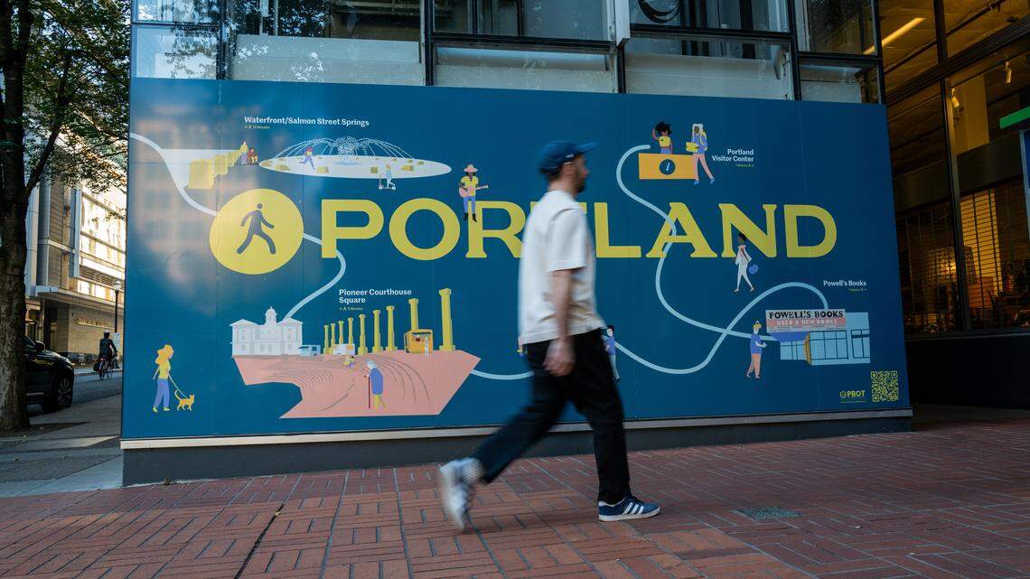 A person walks through the downtown section in Portland, Oregon.