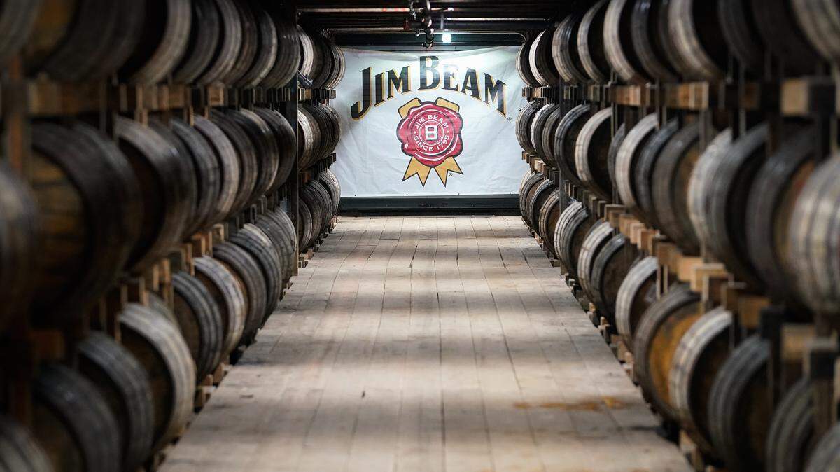 Barrels of bourbon are stacked in a barrel house at the Jim Beam Distillery.