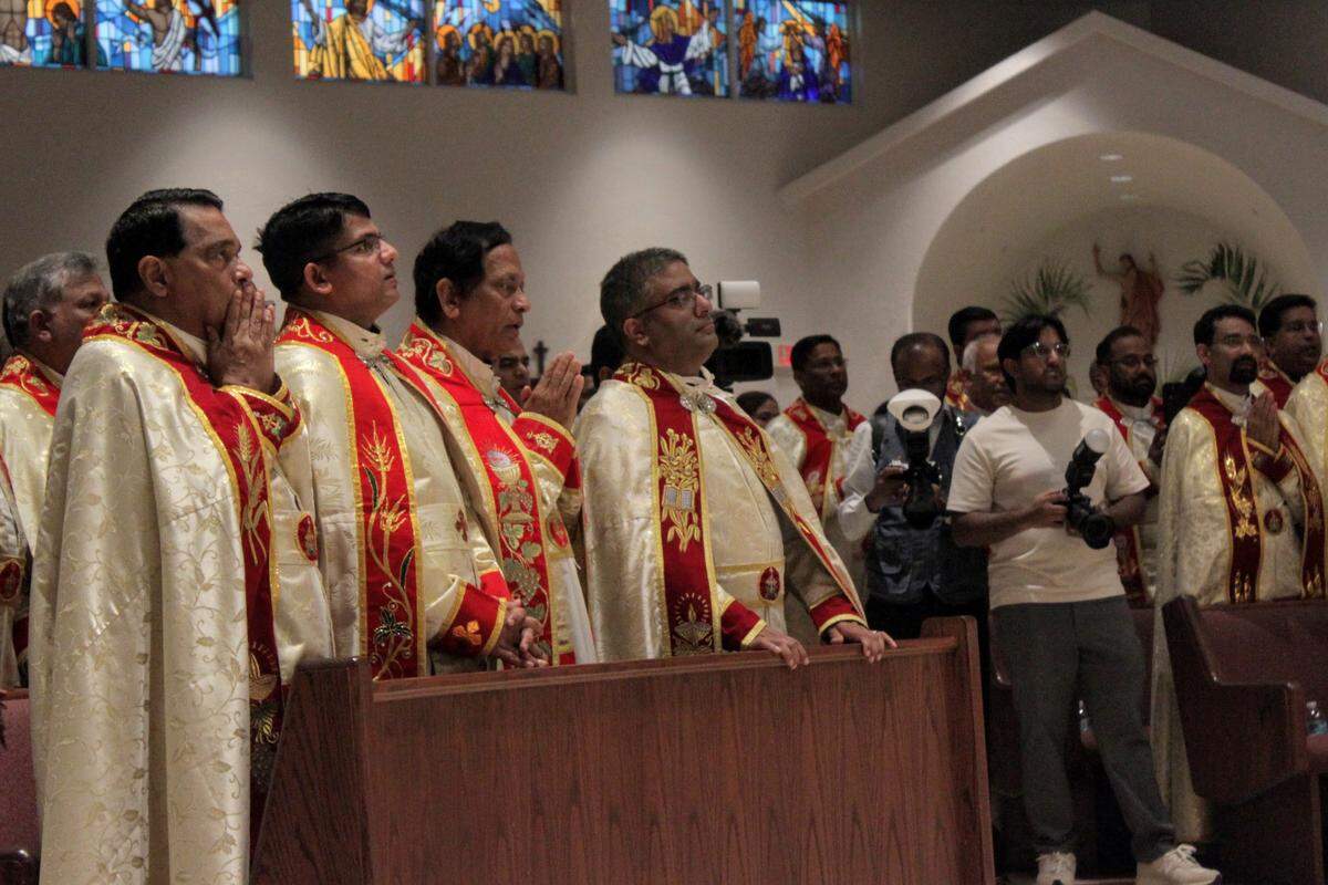 The mass, performed by a group of priests, was celebrated in both and Malayalam, the language spoken in Kerala.