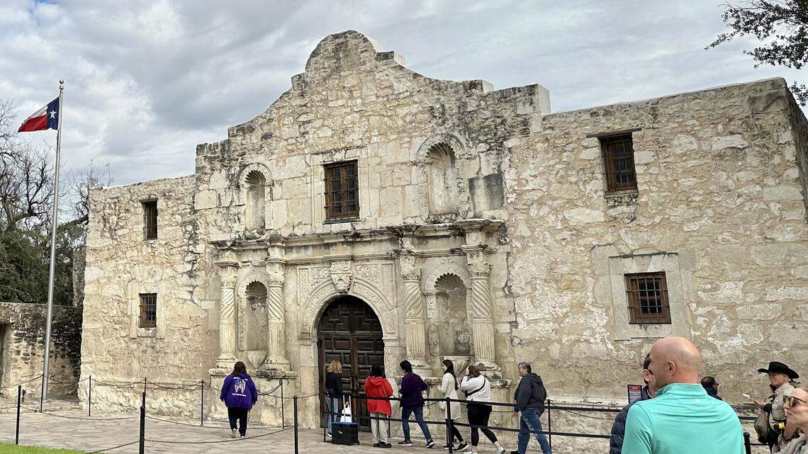 Tourists gather in front of the chapel of the Alamo Mission, known as the “Shrine of Texas Liberty”, in downtown San Antonio Texas.