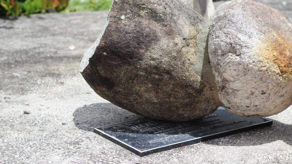 The remaining pieces of Craig Berube-Gray’s Rock-et Man sculpture cover the plaque bearing its name on Tuesday, April 21.