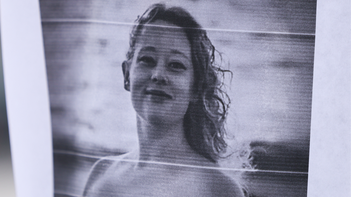 A picture of Renee Nicole Good is displayed near a makeshift memorial for Good, who was shot and killed at point blank range on January 7 by a US Immigration and Customs Enforcement (ICE) agent as she apparently tried to drive away from agents who were crowding around her car, in Minneapolis, Minnesota.