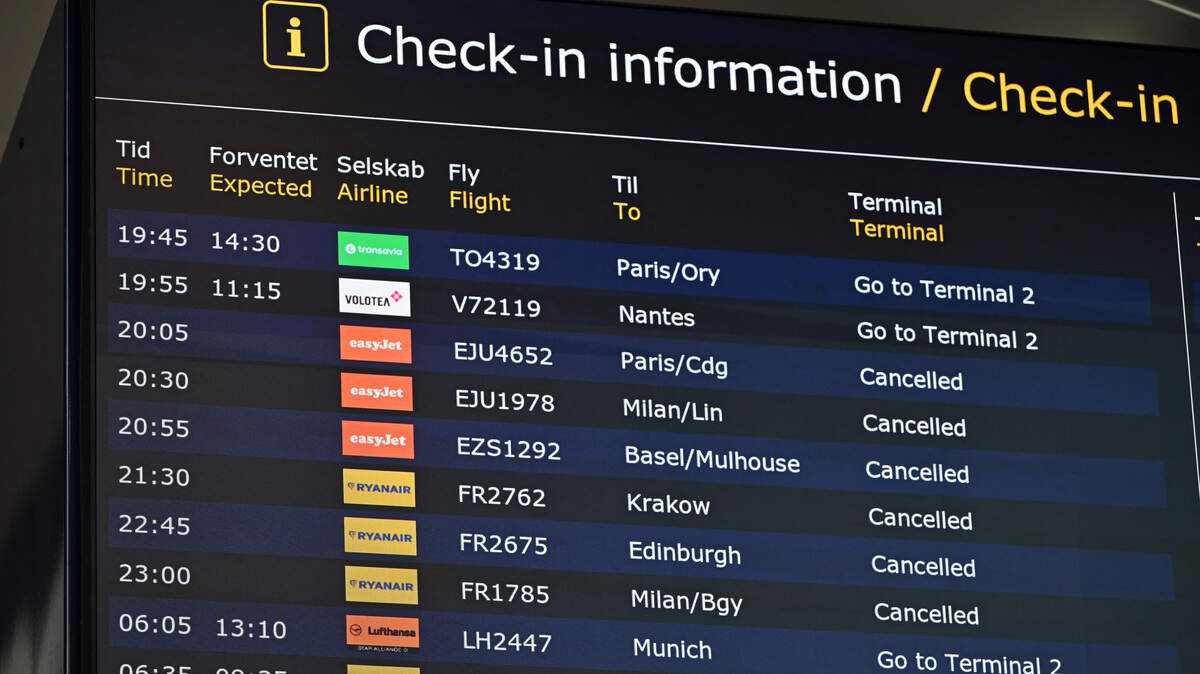 A board displays flight informations at the Copenhagen Airport in Copenhagen, Denmark.