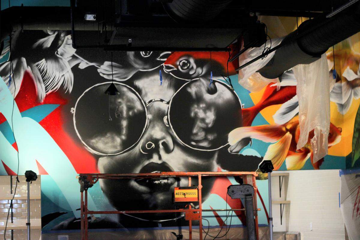 Ubiera sketched the mural in greyscale before adding color, which he said gives pieces more depth.