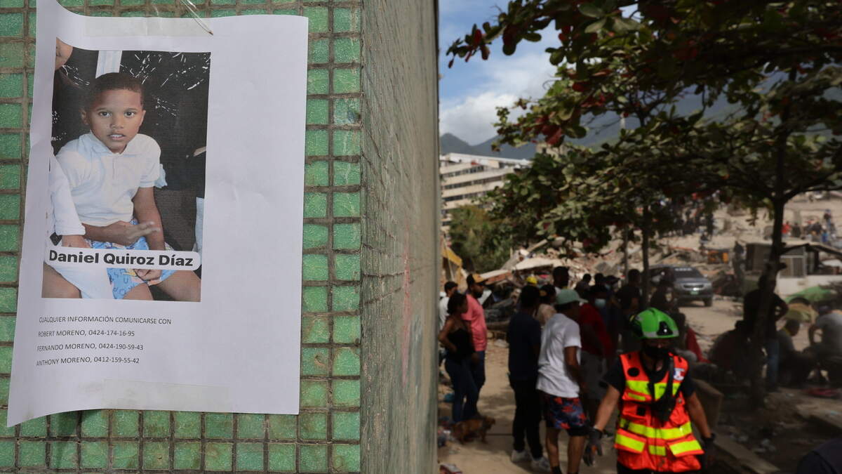 An image of a missing child on a wall following a magnitude 7.2 earthquake that struck Venezuela and other regions in the Caribbean, on June 28, in Carabellada, La Guaira, Venezuela.