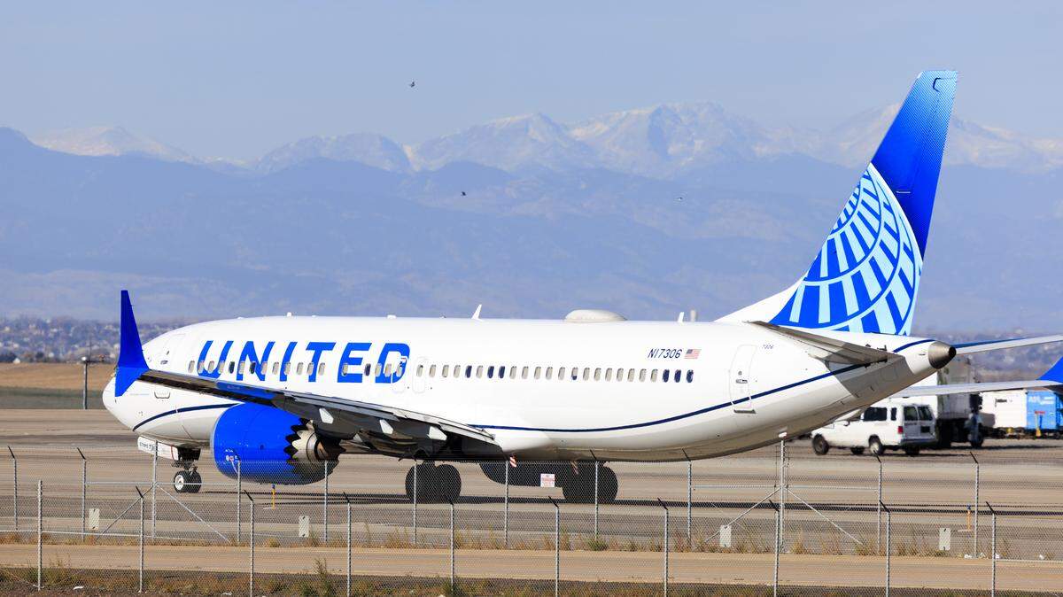 A United Airlines airplane taxis at Denver International Airport