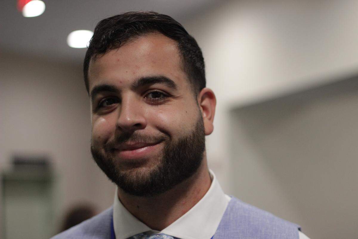 Adam Abutaa poses for a photo at the South Florida Muslim Federation’s annual conference.
