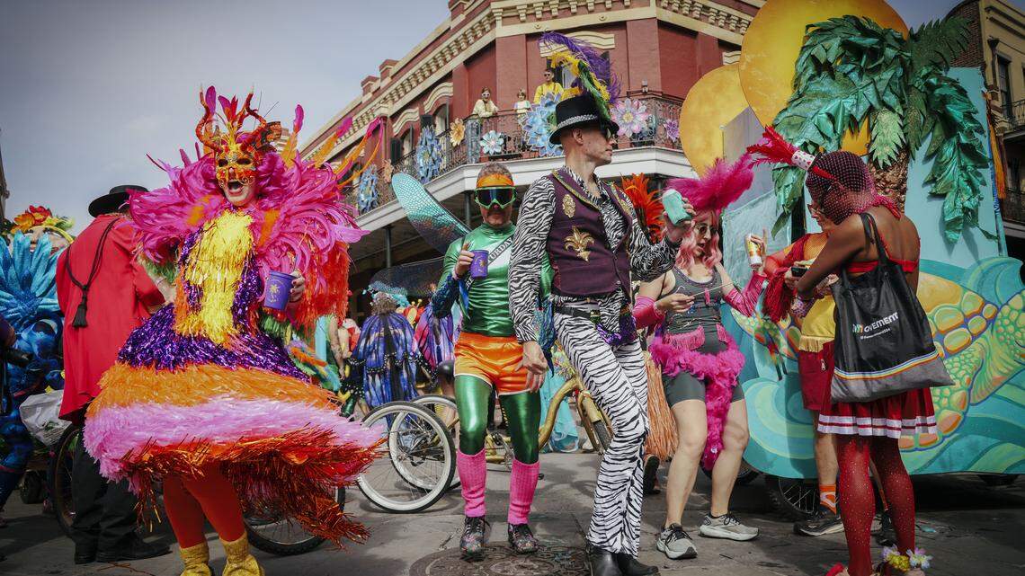 People in costume take part in Mardi Gras Day festivities at Jackson Square in New Orleans
