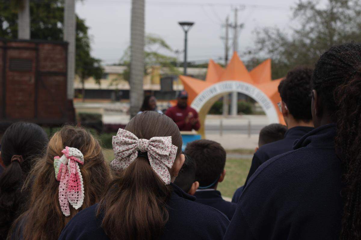 Students from St. Andrews Catholic School, a short walk from Coral Springs City Hall, attended the opening of the cattle car exhibit.
