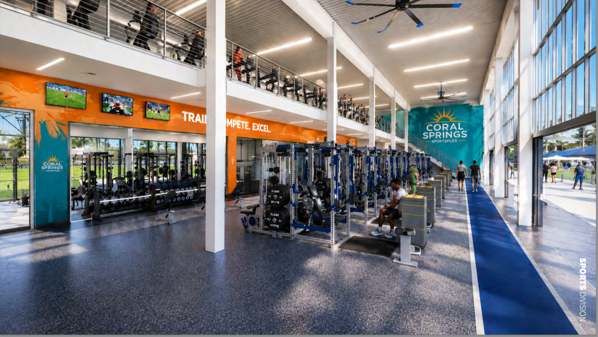 A proposed workout center includes weight machines and cardio training, lit from the side using a wall of windows. The lower portion appears to have the ability to open onto an outdoor space with roll-up window panels.