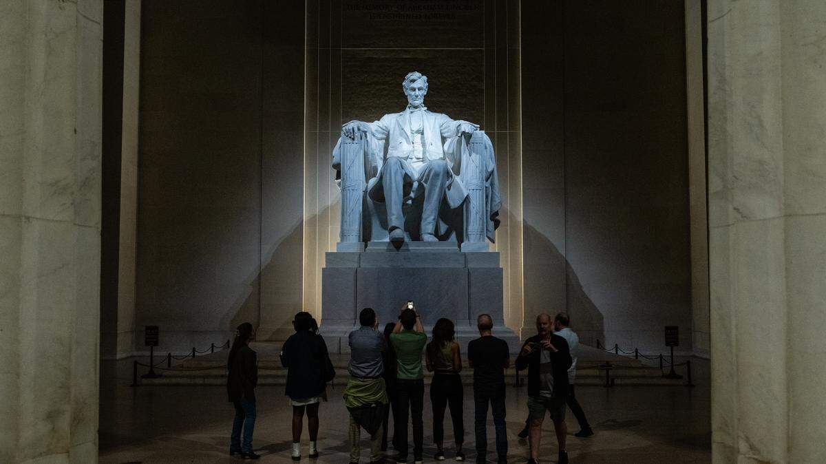 People visit the Lincoln Memorial in Washington, DC.