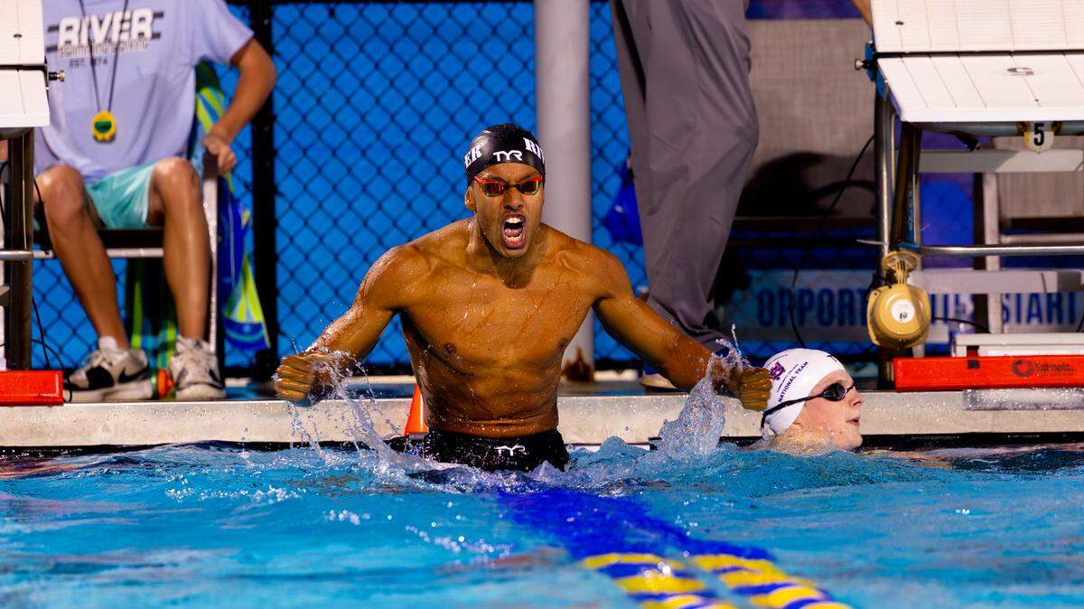 Marcus Johnson celebrates after breaking the 100-yard breaststroke record he set earlier that day during the March 5, 2026 National Junior College Athletics Association National Championships.