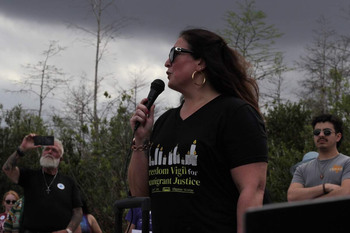 Christine Calareso Bleecker, an attorney and the founder of Joyful Resistance, speaks during a vigil at Alligator Alcatraz on March 1.