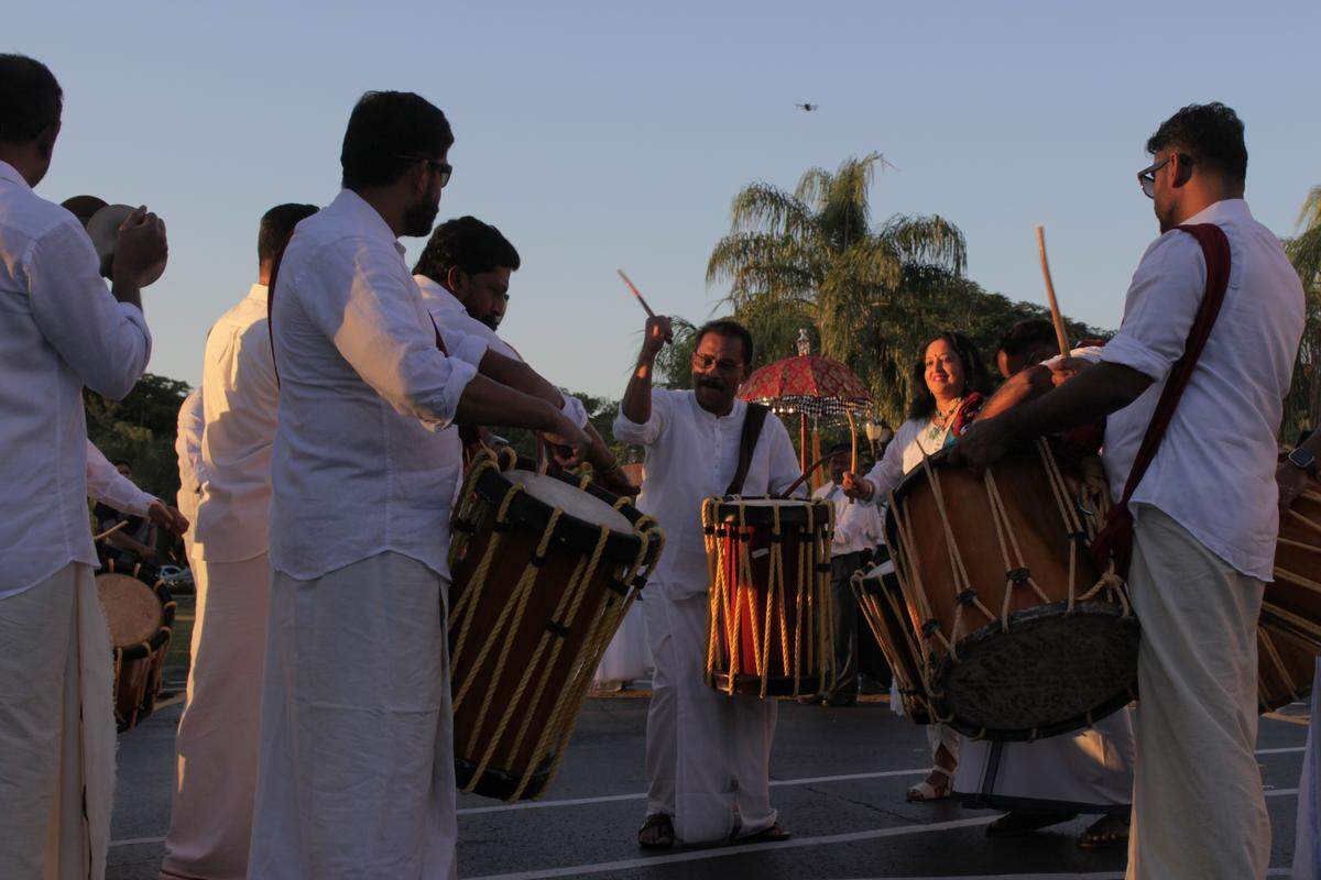 A group performs with chenda, a style of drum from Kerala.