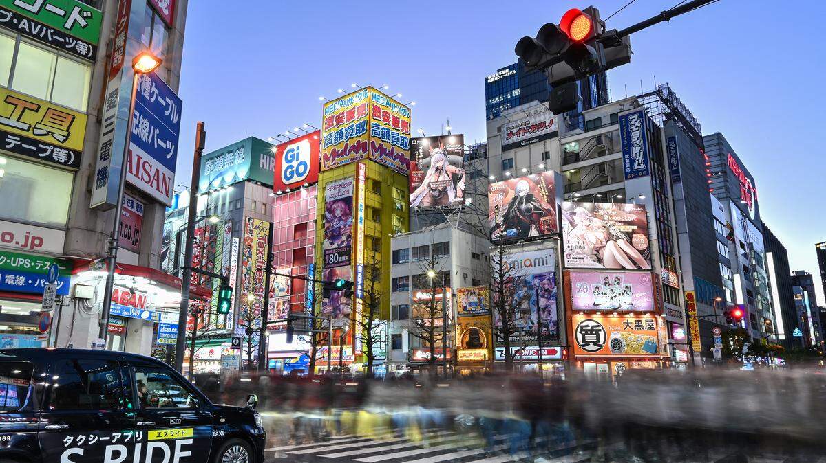 The view at dusk of the lights in the popular electronics and anime area of Akihabara in central Tokyo.